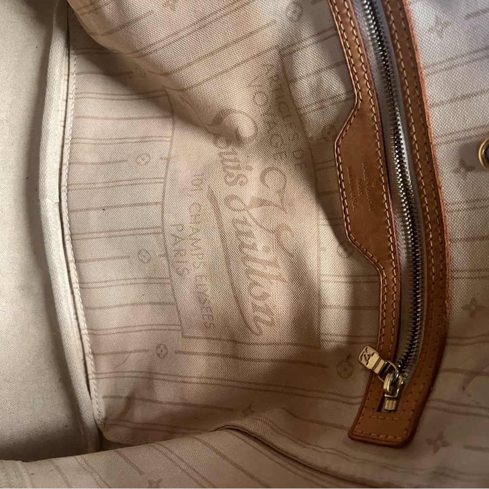 Louis Vuitton White and Tan Checkered Tote
Deleting closet within 24 Hrs. $400 - Picture 3 of 6